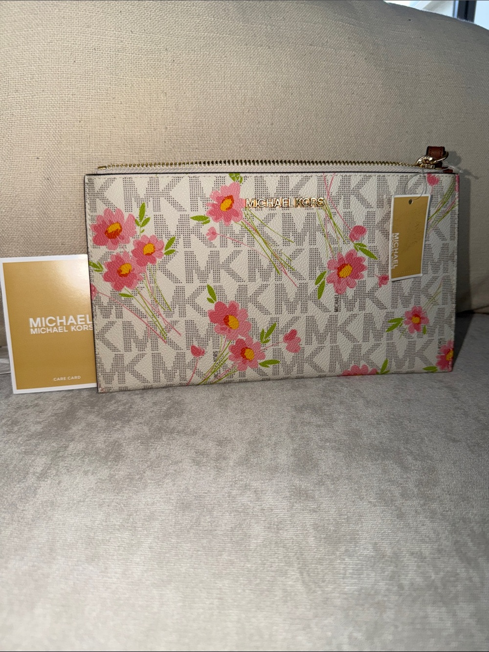 ❤️NEW!!!❤️ Michael Kors Cream MK Logo Floral Wristlet with Brown Strap